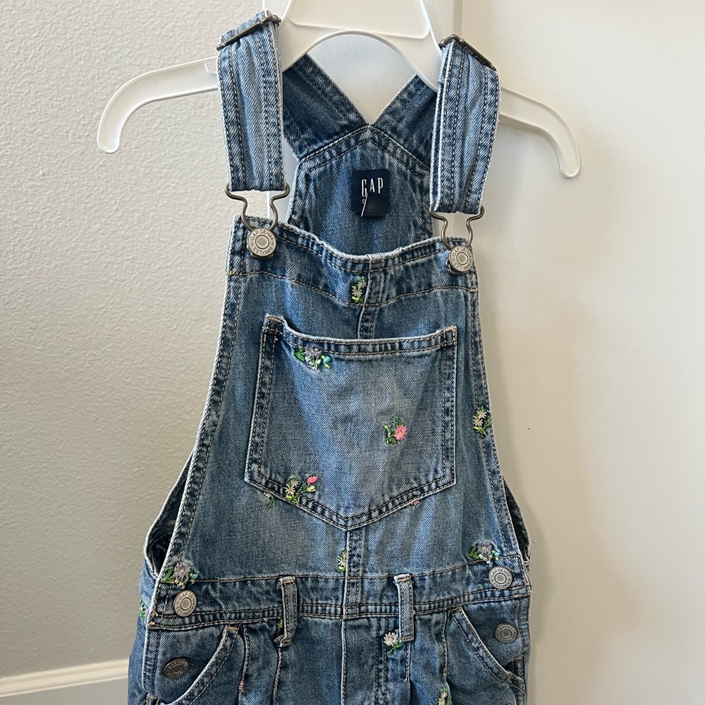 Denim overalls with embroidered flowers